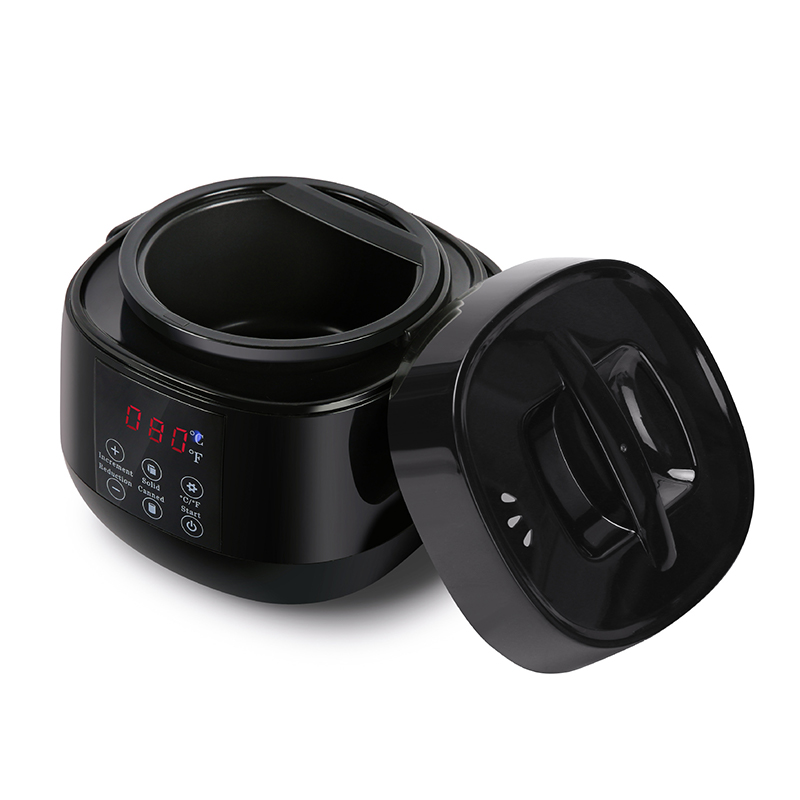 Liten vokssmeltedigel med sort håndtak